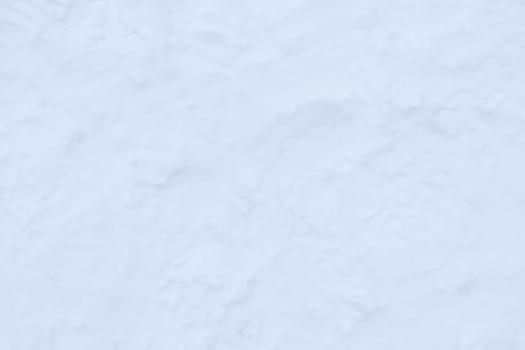 Snow boots track surface. Ski boot texture. Shoe sole traces background.