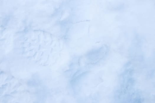 Snow boots tracks surface. Ski boots texture. Shoe sole traces background.