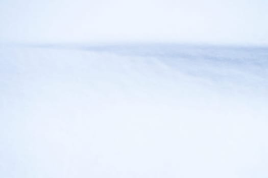 Snowy wind mound background. Winter cold weather texture.