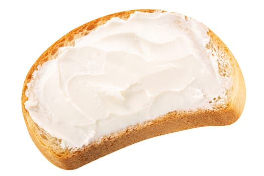 Bread baguette slice with soft cream cheese atop isolated, top view
