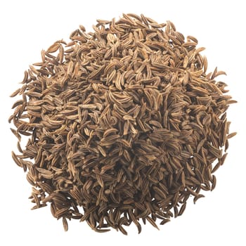 Pile of dried caraway seeds (Carum carvi fruits), isolated, top view
