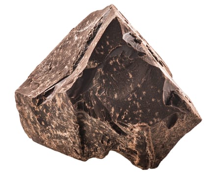 Chunk of roughly crushed chocolate or solid cocoa mass, isolated