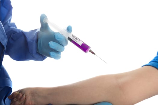 doctor in protective gloves give vacina to women