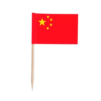 Miniature paper flag China. Isolated Chinese toothpick flag pointer on white background.