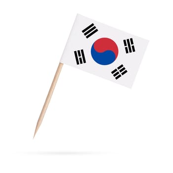 Miniature paper flag South-Korea. Isolated South Korean toothpick flag pointer on white background. With shadow below