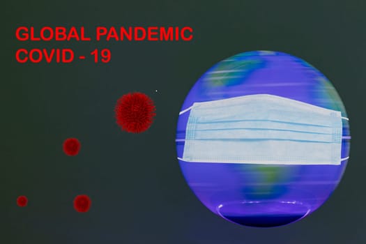 Global pandemic concept. 3D illustration of an colorful from inside illuminated spinning terrestrial globe earth with mask and an inscription Global pandemic covid and abstract models of a novel strain of the corona virus COVID-19 on dark background.