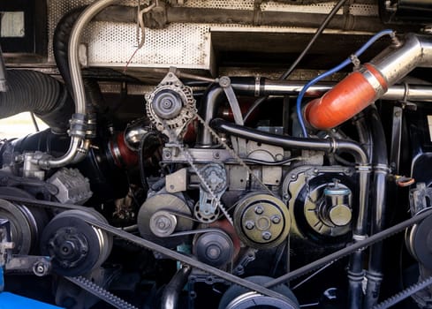 View  pulley and belts on a bus engine