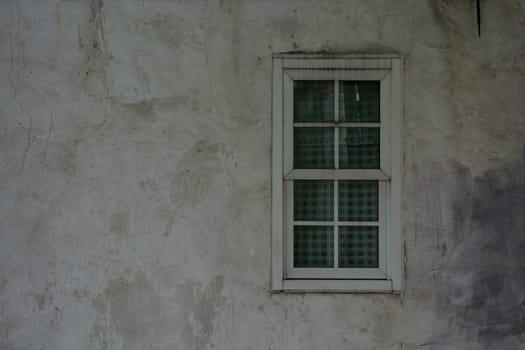 Vintage window on nice color cement wall can be used for background