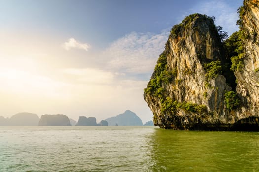 View of Koh Hong island in Andaman Sea with Phuket coastline on the horizon