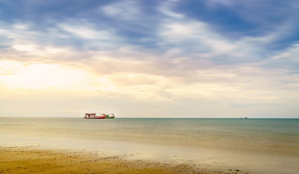 Fishing boats anchored off Bang Thao Beach in Phuket, Thailand