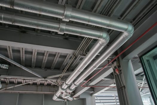 cables and piping as found inside of a thermal power
