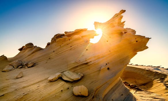 Sandstone formations in Abu Dhabi desert in United Arab Emirates
