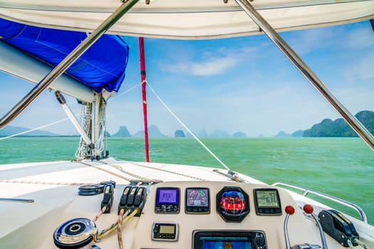 Cockpit of a sailboat with the view of the islands in Andaman Sea in Thailand