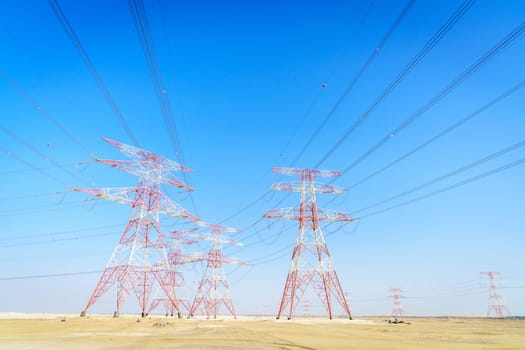 High voltage overhead transmission lines in Abu Dhabi desert