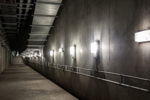 Empty industrial garage room interior with concrete floor and wall background