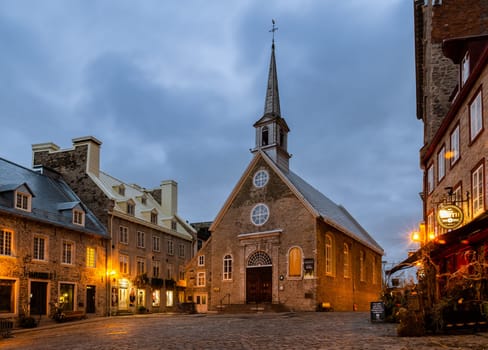 Quebec, Canada - October 16, 2018: Early Morning View of Notre-Dame-des-Victoires Church in Place Royale of Old Quebec city, Canada.