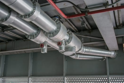 cables and piping as found inside of a thermal power