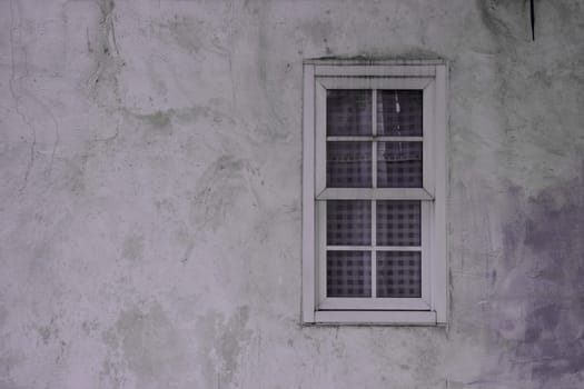 Vintage window on nice color cement wall can be used for background