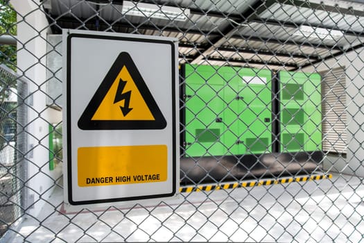 Electric power station in metal fence