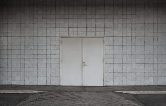 steel door and concrete surrounding.