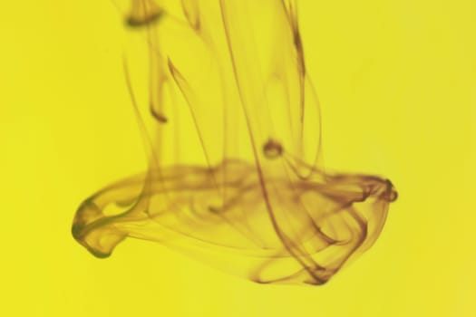 Liquid Drop Fantasy Art. Ink Drip in Water. Abstract Background.