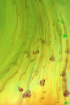 Falling Colored Ink Drops Dynamic Motion in Water. Soft Ambient Background.