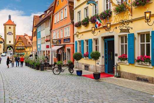 Rothenburg Ob Der Tauber, Germany - SEPTEMBER 24, 2014: View on old city street with traditional architecture of Rothenburg Ob Der Tauber, Bavaria, Germany, Europe