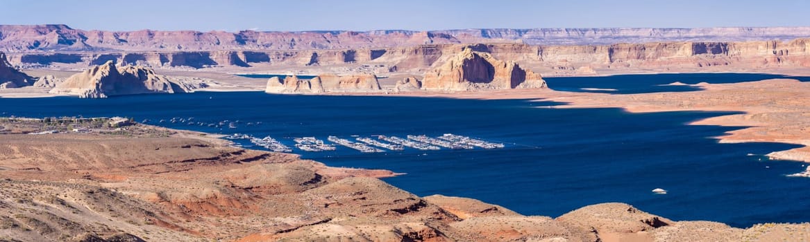 Panorama of Lake Powell in desert Landscape and yacht Marinas recreation center at Page city Arizona, United States. USA Landmark environmental water resources reservoir sport and recreation concept.