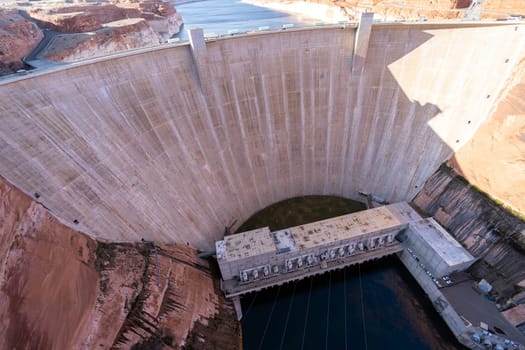 Glen Canyon Dam with Lake Powell in the Desert rural area of Page city Arizona, United States. USA Landmark environmental water resources reservoir and electricity concept.