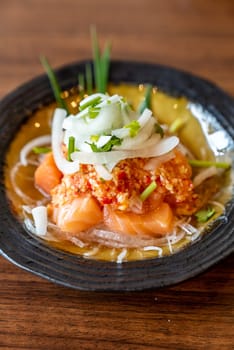yum spicy salmon salad in Thai Style cuisine