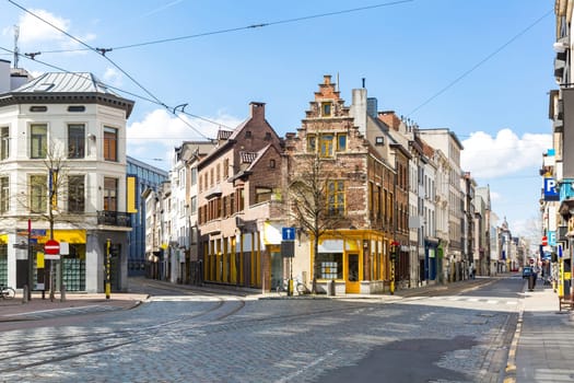 Cityscape of Meir shopping street road in Antwerp downtown in Belgium with tram track. EU Begium city landmark and shopping center for tourism and travel destination concept.
