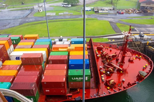 Panama Canal, Panama - December 7, 2019: A cargo ship entering the Miraflores Locks in the Panama Canal, in Panama