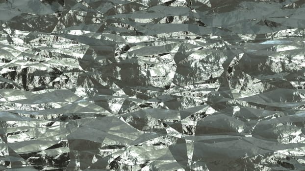Silver shiny crumpled metallic foil seamless background texture surface.