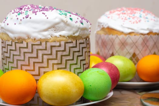 compilation of Easter cakes and painted multi-colored eggs