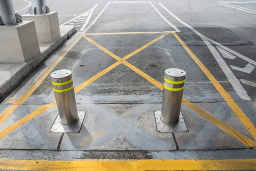 bollards with Security at the gate