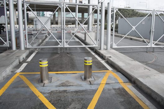 bollards with Security at the gate