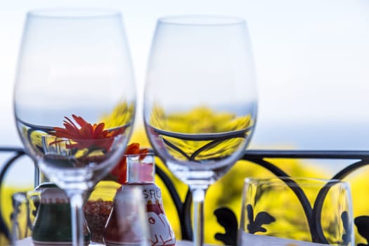 Restaurant table overlooking the sea on the Amalfi coast in Italy.