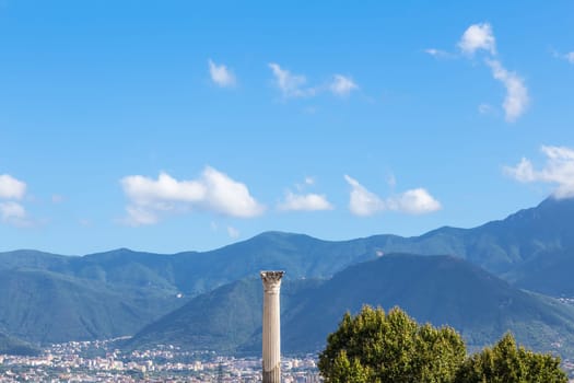Pompeii in Italy, ruins of the antique Temple of Apollo with bronze Apollo statue, Naples.