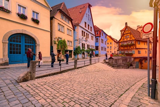 Rothenburg Ob Der Tauber, Germany - SEPTEMBER 24, 2014: View on old city street with traditional architecture of Rothenburg Ob Der Tauber, Bavaria, Germany, Europe
