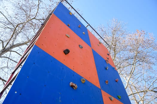 A wall to train climbers. Artificial stones are ledges on the wall.
