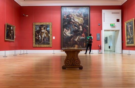 Dublin, Ireland - Feb 20th, 2020: National Gallery of Ireland Building Indoors. People visiting historic wings