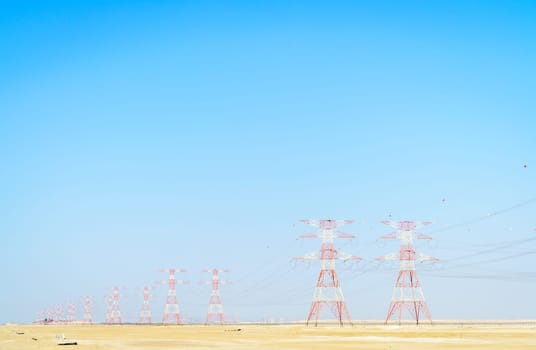 High voltage overhead transmission lines in Abu Dhabi desert