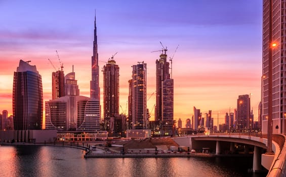 Scenic view of skyline of Dubai's downtown at sunset