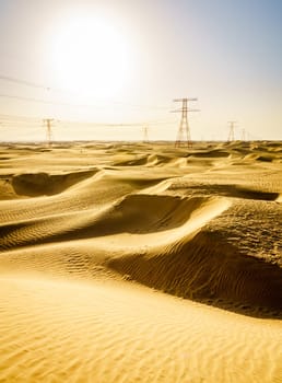 High voltage overhead transmission lines in Abu Dhabi desert