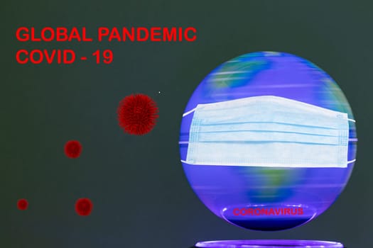 Global pandemic concept. 3D illustration of an colorful from inside illuminated spinning terrestrial globe earth with mask and an inscription Global pandemic covid and abstract models of a novel strain of the corona virus COVID-19 on dark background.