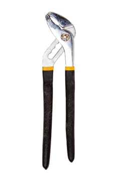 Pliers isolated. Close-up of an closed metal adjustable waterpump pliers with black yellow handles isolated on a white background. Macro photograph.