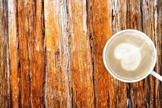 The 3d rendering of coffee with nice flower foam on the table