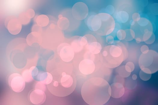 Abstract bright spring or summer landscape texture with natural light pink orange bokeh lights and blue bright sunny sky. Autumn or summer background with copy space.