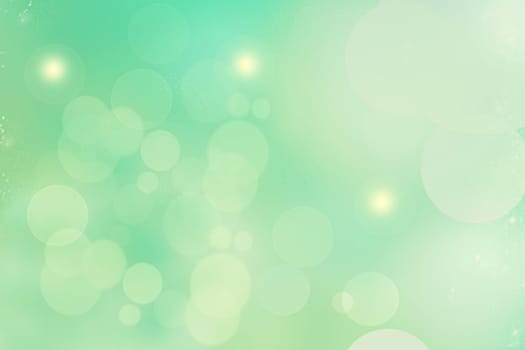 Abstract gradient green light turquoise shiny blurred background texture with circular bokeh lights. Beautiful backdrop. Space for design.