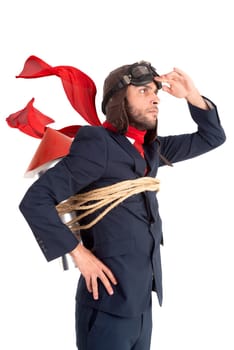 Businessman with homemade rocket and googles ready for a challenge